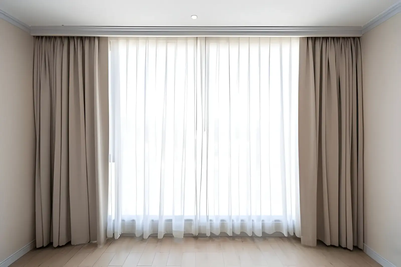 Full-length blackout curtains in a Dubai bedroom