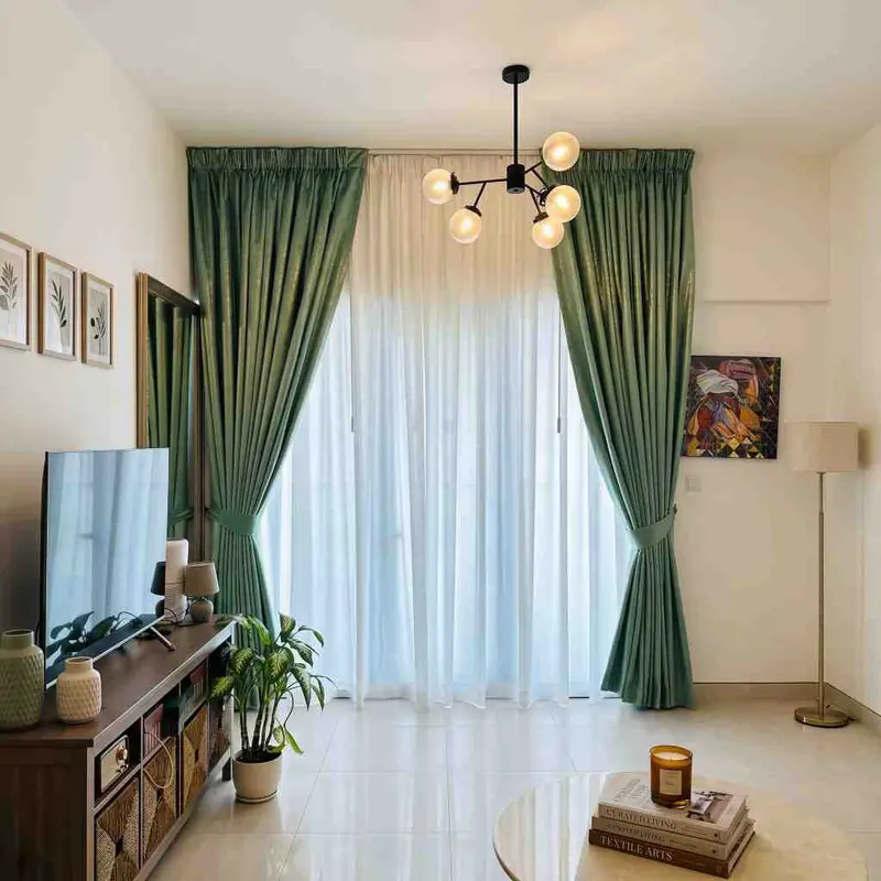 Triple Pinch Pleat Curtains fitted in a Dubai home