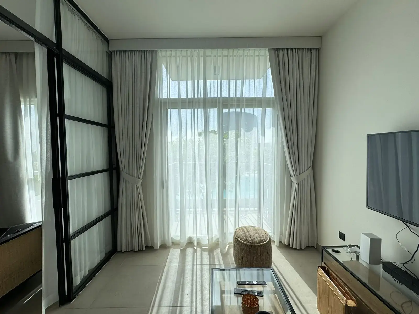Floor-to-ceiling curtains fitted in a Dubai apartment